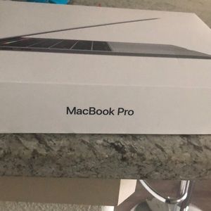 MacBook Pro 2018. Will come in box with charger.